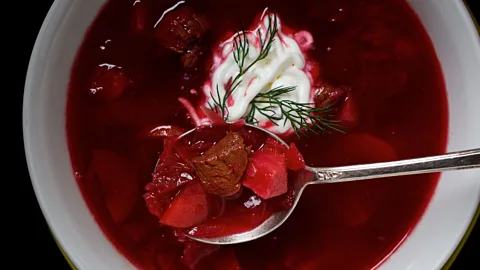 Deb Lindsey For The Washington Post/Getty Images Ukrainian borsch, made with meat, cabbage, potatoes and beetroot, is by far the best-known version (Credit: Deb Lindsey For The Washington Post/Getty Images)