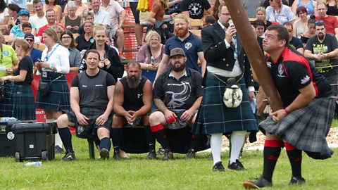 Caroline Bishop The Appowila Highland Games include traditional disciplines like caber tossing (pictured), stoneput and hammer throw (Credit: Caroline Bishop)