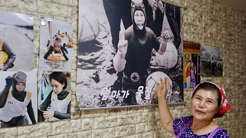 Hahna Yoon The walls of Park and Ko's restaurant are filled with images of divers, cards from customers and a signed letter from the Korean president (Credit: Hahna Yoon)