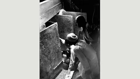 Griffith Institute, University of Oxford The excavation by Carter (here, kneeling in the burial chamber) was one of the most important archaeological finds of the 20th Century; many of the objects have yet to be studied