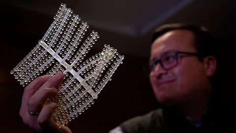 Getty Images A biodegradable material that engineers claim dissolves 100% upon with water is unveiled at a technology summit in Chile (Credit: Claudio Reyes/AFP/Getty Images)