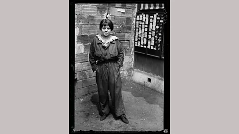 Excelsior-L’Equipe/ Roget-Viollet A 1917 photograph of a woman in work clothes, taken in Paris, is also among the exhibits (Credit: Excelsior-L’Equipe/ Roget-Viollet)