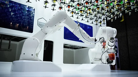 Getty Images Tending bar requires lots of skills that can’t be automated yet – It’s process-driven tasks like document review that are more susceptible to change (Credit: Getty Images)