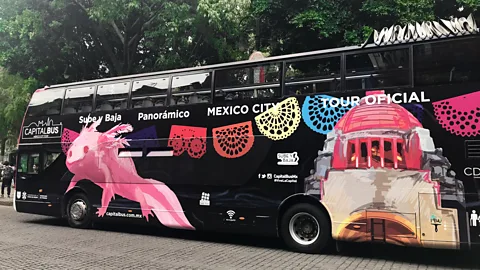 Megan Frye The latest official Mexico City tour bus features the image of an albino axolotl (Credit: Megan Frye)
