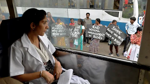 Getty Images Protestors call for the end of the harassment of city bus passengers in Bangalore, where a study found two-thirds of female passengers face regular violence (Credit: Getty Images)