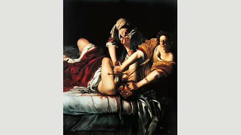 Alamy Gentileschi showed Judith decapitating the Assyrian general Holofernes Judith in a graphic, brutal composition (Credit: Alamy)