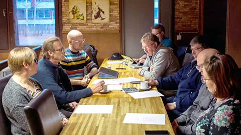 Saila Huusko Members of the Puolanka Pessimist association meet in the town (Credit: Saila Huusko)