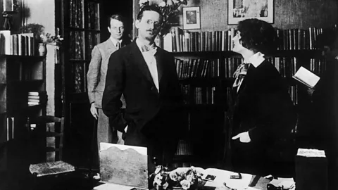 Getty Images James Joyce with Shakespeare and Company’s founder Sylvia Beach in the shop’s interior (Credit: Getty Images)