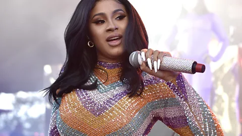 Getty Images In a viral Instagram video, American hip-hop star Cardi B says it's the text parts of Instagram that are bad for mental health, not the number of 'likes' (Credit: Getty Images)