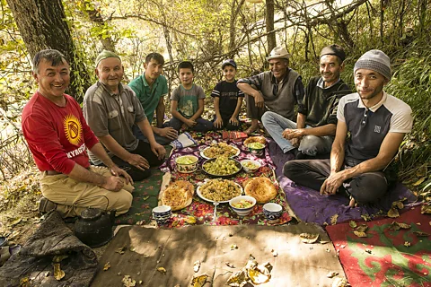 Mayank Soni At the end of the harvest, it is tradition for each family to cook a feast and share it with their neighbours (Credit: Mayank Soni)