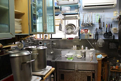 Nancy Singleton Hachisu In 2012, Yoshida added a tiny kitchen and placed some tables in the waiting room of his used-car dealership and began offering ramen to customers (Credit: Nancy Singleton Hachisu)