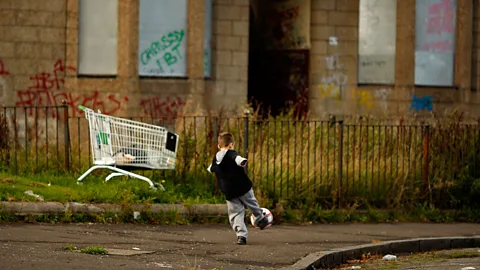 Getty Images A study has shown that living in a deprived area can lead to major depressive disorder in men, but not in women (Credit: Getty Images)