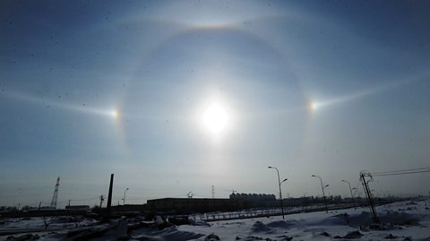 A sun halo appearing in the sky