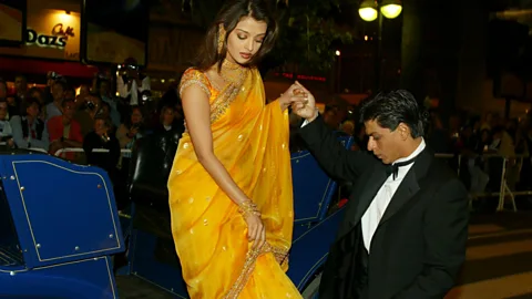 Benainous/Duclos/Gamma-Rapho Shah Rukh Khan with actress and Miss Universe Aishwarya Rai at the Cannes film festival in 2002 (credit: Benainous/Duclos/Gamma-Rapho)