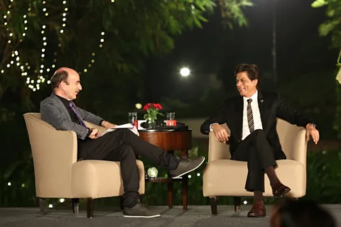 Tom Brook and Shah Rukh Khan spoke in front of a live audience in Mumbai for BBC World News' Talking Movies (credit: BBC)