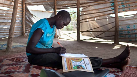 Getty Images More women would be able to complete their education and join the workforce if they had total control over when and how they had children (Credit: Getty Images)