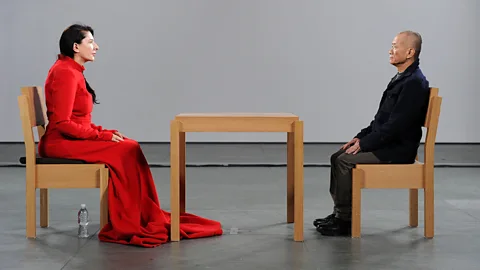 Getty Images For her 2010 performance The Artist is Present, Marina Abramović met the gaze of strangers at MoMA – many of whom were moved to tears (Credit: Getty Images)