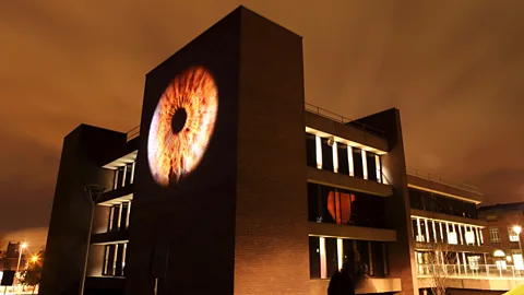 Getty Images Gina Czarnecki’s huge projections use the same iris scanning technology as that used in airports – allegedly the most accurate non-invasive identification (Credit: Getty Images)