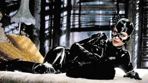 Warner Brothers In the 1992 film Batman Returns Michelle Pfeiffer plays Catwoman, who wears a latex catsuit (Credit: Warner Brothers)