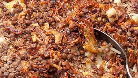 Thomas Bertson/Getty Images Koshari is both Egypt’s national dish and a hugely popular street food (Credit: Thomas Bertson/Getty Images)