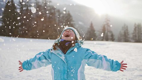 Girl playing in snow