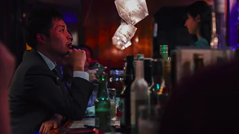 Shiho Fukada and Keith Bedford "I feel Japanese people live a life in a group," says Bar Hitori patron Kai Sugiyama. "We don’t have much culture of doing things alone" (Credit: Shiho Fukada and Keith Bedford)