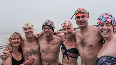 Hugh Fearnley-Whittingstall with cold water swimmers