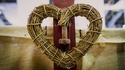 Straw folded to form a heart shape