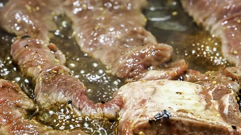 sfe-co2/Getty Images Galbi is a traditional Korean dish of marinated beef short ribs grilled over smoking coals (Credit: sfe-co2/Getty Images)