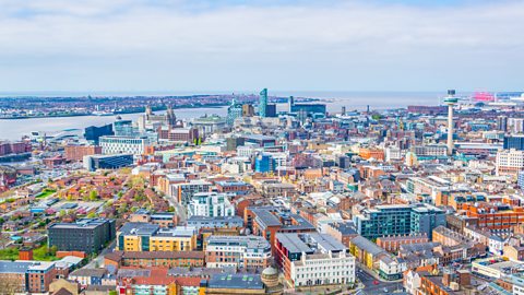 A photo of a large city from above with lots of tall buildings.