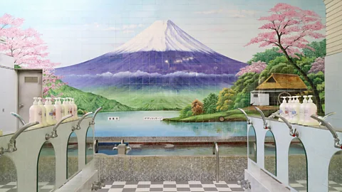 Stephanie Crohin Many sento are adorned with nature scenes on the walls, such as this depiction of Japan’s most enduring and powerful landmark: Mount Fuji (Credit: Stephanie Crohin)