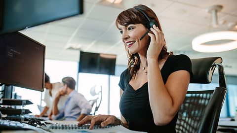 Photo of a woman in an office working in an office.