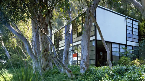 Getty Images The Eames House is a triumph of mid-century design, with open-plan spaces and blocks of colour on the facade (Credit: Getty Images)