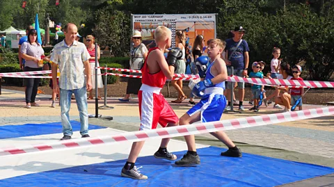 Sarah Reid Makeshift boxing rinks are part of the fun on Independence Day (Credit: Sarah Reid)
