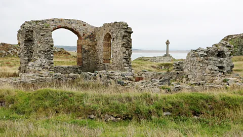 Mike MacEacheran Several ruins relating to Saint Dwynwen remain on uninhabited Llanddwyn Island (Credit: Mike MacEacheran)