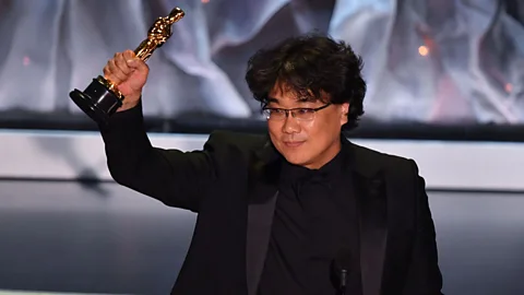 Getty Images Bong Joon-ho holding his Oscar (Credit: Getty Images)