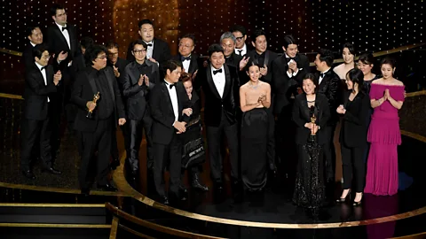 Getty Images The Parasite team accept the Oscar for best picture