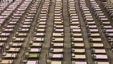 Getty Images The authorities in China have been converting public exhibition centres into makeshift hospitals to handle mild cases of the coronavirus (Credit: Getty Images)