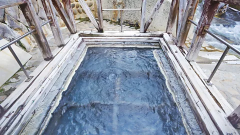 thanyarat07/Getty Images Villagers have transformed a small opening where hot water bubbles up from underground into a communal kitchen (Credit: thanyarat07/Getty Images)