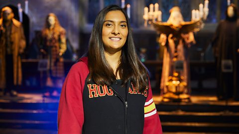 Brooke in the Great Hall, smiling.