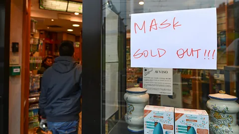 Getty Images One of the ways panic buying backfires is that it depletes supply for goods needed by medical professionals, like this pharmacy selling face masks in Milan (Credit: Getty Images)