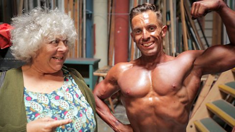 Who Miriam meets along the way Miriam poses next to a body builder with a look of amusement on her face while he shows off his muscles