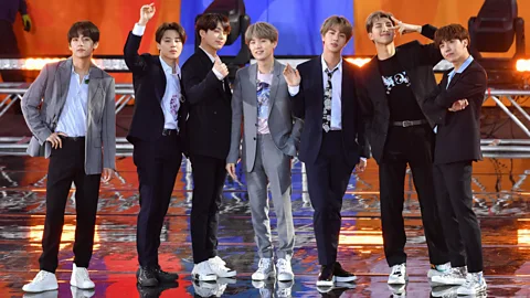 Alamy The seven-member boy band BTS formed in 2010, and have since become the first group since The Beatles to top the US charts with three albums in less than a year (Credit: Alamy)