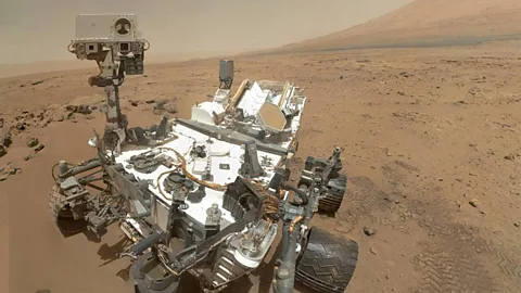 Nasa Mars rovers like Curiosity have be assembled in clean rooms so they don't infect the Martian surface with Earth microbes (Credit: Nasa)