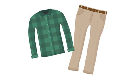 A green shirt and khaki trousers.