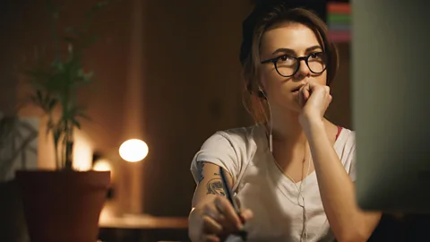 Alamy One study found that jobs that were more cognitively demanding, like programming, allowed workers to listen to music more (Credit: Alamy)