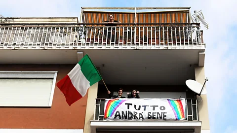 Marco Di Lauro/Getty Images Ostia residents display a banner which reads "everything will be fine" (Credit: Marco Di Lauro/Getty Images)