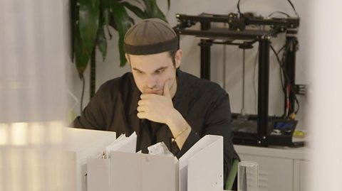 Ryan working at his desk.