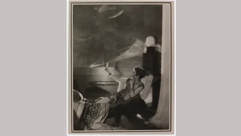 Centre Pompidou, Bibliothèque Kandinsky, Paris. Fond Eileen Gray Mme Juliette Mathieu-Levy reclines on the Pirogue chaise longue designed by Eileen Gray, 1922