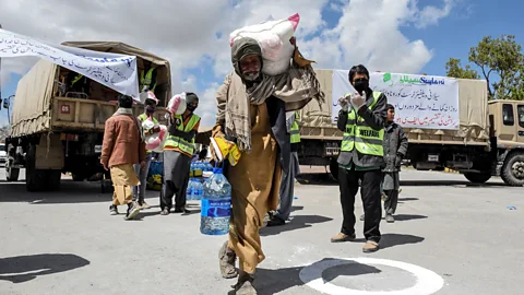 Banaras Khan/Getty Images Pakistan is one of the world's most generous nations, and a recent study found that 98% of Pakistanis donate time or money to charity (Credit: Banaras Khan/Getty Images)